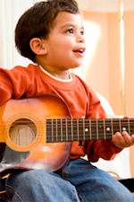 Child playing guitar